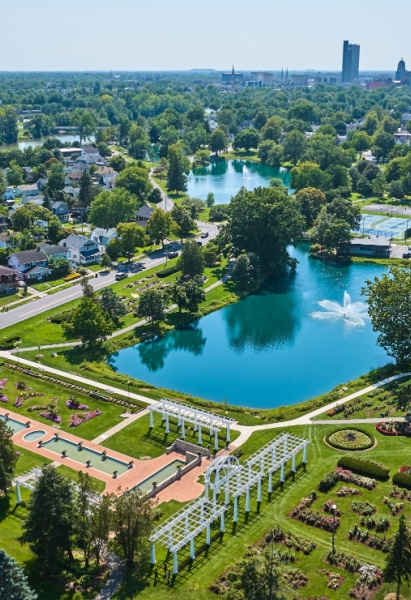 Aerial Lakeside Park gardens and fountains with distant downtown Fort Wayne, Indiana